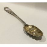 A good Georgian bright cut silver berry spoon deco