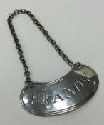 An unusual oval Georgian silver wine label for 'Br