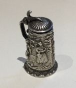A small Dutch silver lidded tankard with chased de