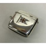 A silver vesta case with enamelled decoration. She