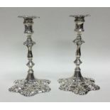 A rare pair of Georgian silver taper candlesticks