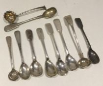 A bag containing heavy silver condiment spoons. Va