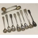 A bag containing heavy silver condiment spoons. Va