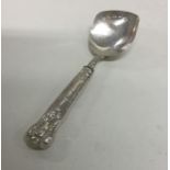 A Victorian silver caddy scoop. Birmingham. By IT.