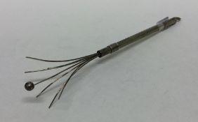 An Edwardian silver swizzle stick. Approx. 7.5 gra