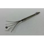 An Edwardian silver swizzle stick. Approx. 7.5 gra