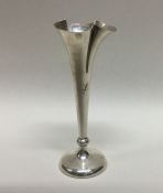 A silver spill vase with shaped rim. Birmingham. B