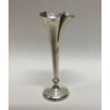 A silver spill vase with shaped rim. Birmingham. B