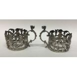 A pair of pierced silver tea / espresso glass hold