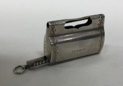 A rare silver vesta case in the form of a briefcas
