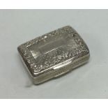 An attractive chased George III silver vinaigrette