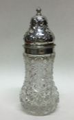 An Edwardian silver and cut glass mounted caster.