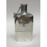 An attractive Victorian silver hip flask with remo