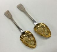 A good pair of fiddle pattern silver gilt berry sp
