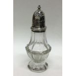 A Georgian style silver and glass mounted sugar ca