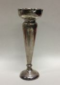 An Edwardian silver spill vase with crimped rim. S