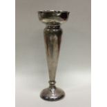 An Edwardian silver spill vase with crimped rim. S