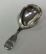 A George II silver caddy spoon. London 1823. By El