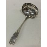 A pierced and engraved silver sifter spoon. Birmin