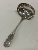 A pierced and engraved silver sifter spoon. Birmin