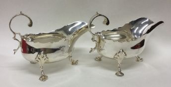 A good pair of Victorian crested silver sauce boat