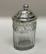 An oval silver and glass mounted mustard pot. Shef