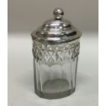 An oval silver and glass mounted mustard pot. Shef
