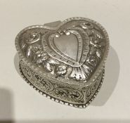 A good quality Edwardian silver heart shaped ring