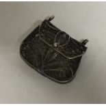 A Continental silver model of a bag with hinged to