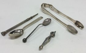 A pair of Georgian silver bright cut sugar tongs,