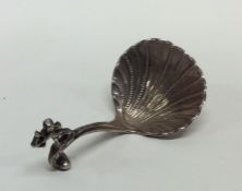 An 18th Century Dutch silver caddy spoon with flut