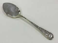 A heavy Victorian silver jam spoon with chased han