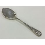 A heavy Victorian silver jam spoon with chased han