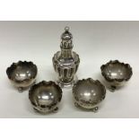 A set of four Edwardian silver salts with crimped