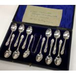 A fine cased set of twelve silver teaspoons togeth