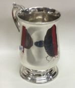 A good George lll baluster shaped silver tankard w