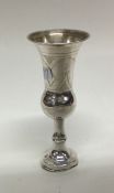 An engraved silver Kiddush cup of typical form. Ap