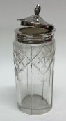 A Victorian cut glass silver mounted mustard pot.