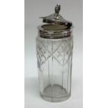 A Victorian cut glass silver mounted mustard pot.