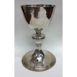 An unusual cased silver chalice together with matc