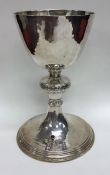 An unusual cased silver chalice together with matc