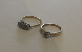 Two 9 carat diamond set rings. Approx. 4 grams. Es