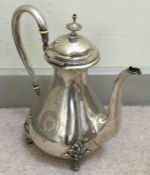 A heavy Continental silver coffee pot with scroll