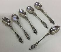 A heavy set of six silver Apostle top teaspoons. L