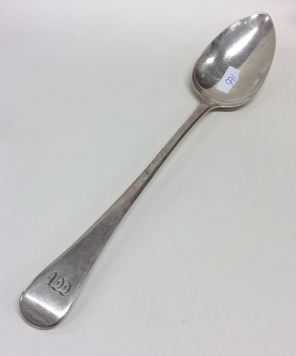 A large OE pattern silver basting spoon. London. B