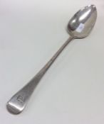 A large OE pattern silver basting spoon. London. B