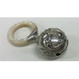 A Continental silver and MOP child's rattle. Appro