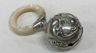 A Continental silver and MOP child's rattle. Appro