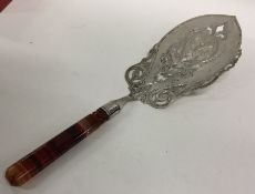 A Dutch silver fish slice with agate handle. Appro