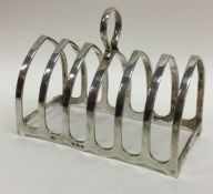 A heavy silver seven bar toast rack. Birmingham. B